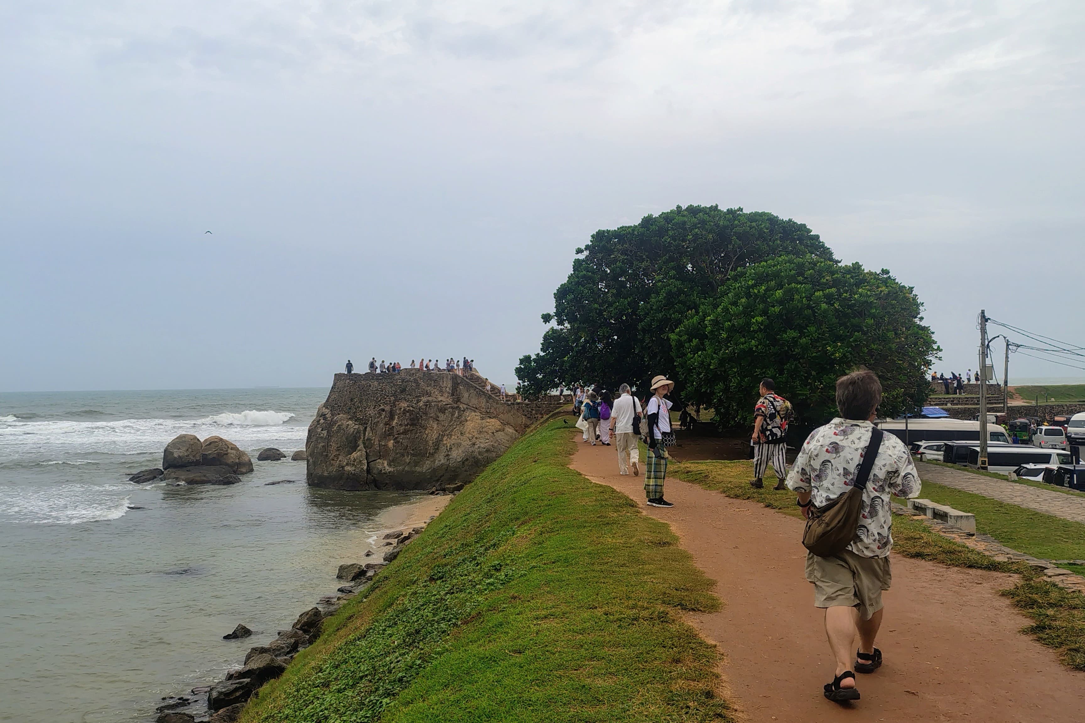 Tourists walking freely on Galle Dutch fort - a famous tourist attraction in Sri Lanka