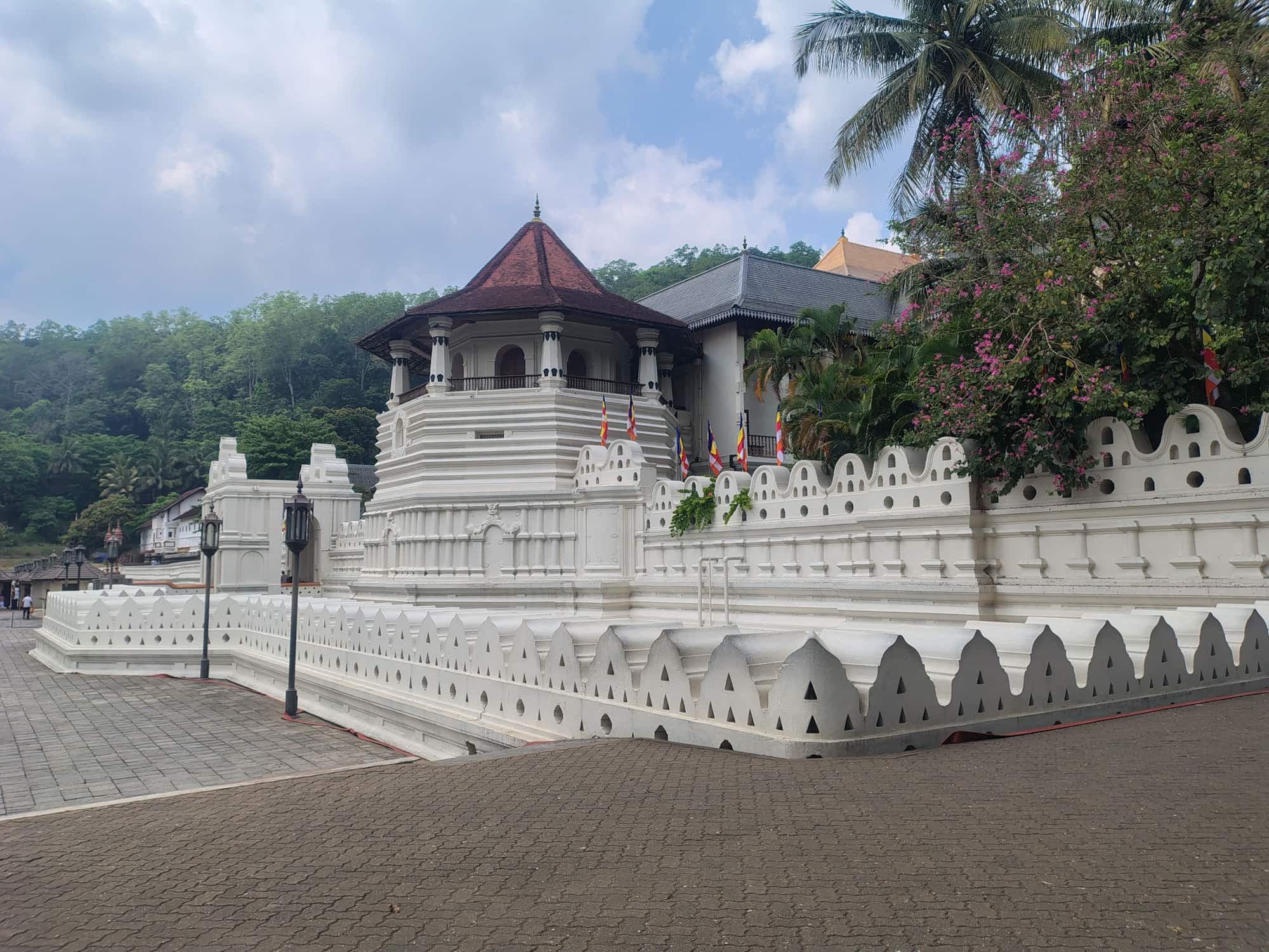 The Temple of the Sacred Tooth Relic in Kandy, Sri Lanka, with its octagonal pavilion and white walls